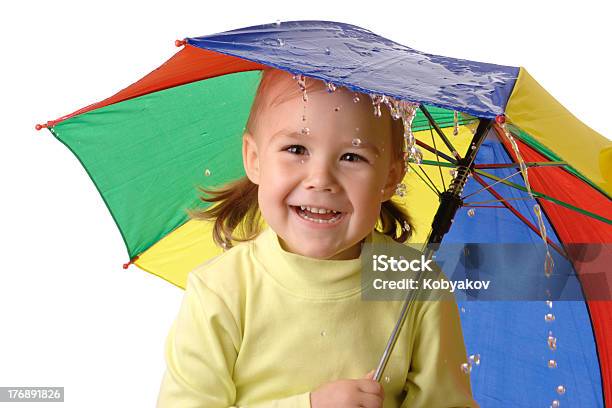 Cute Child Catching Raindrops Under Umbrella Stock Photo - Download Image Now - Child, Rain, White Background