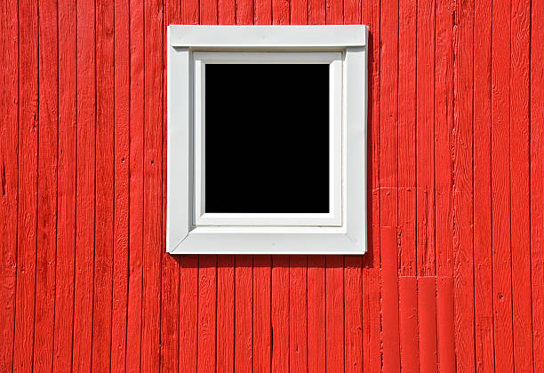 istock White Window on Red Wall of a Caboose 176892152