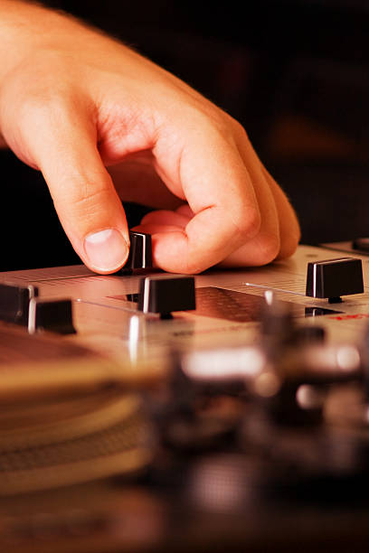 istock Hand of a dj adjusting the crossfader 176893335