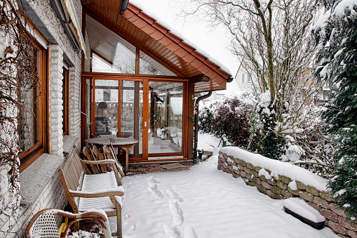 Terrace during winter with entrance to the conservatory.