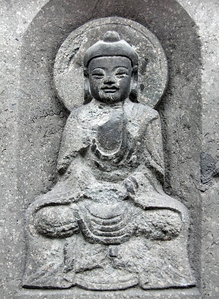 Statue of Buddha made of stone.