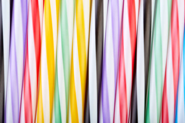istock Striped, colored tubes for cocktails. Colorful background. 1768947672