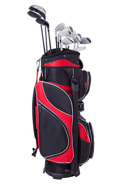 golf clubs in red and black bag isolated on white - golfclub stockfoto's en -beelden