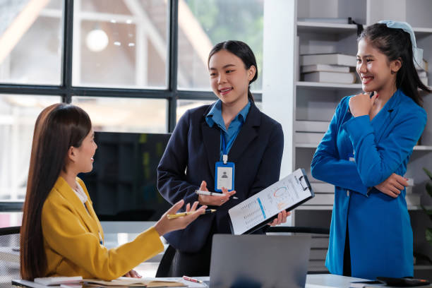 istock Group of Asian business people working together as a teamwork while sitting at the office desk in a creative office 1768962655