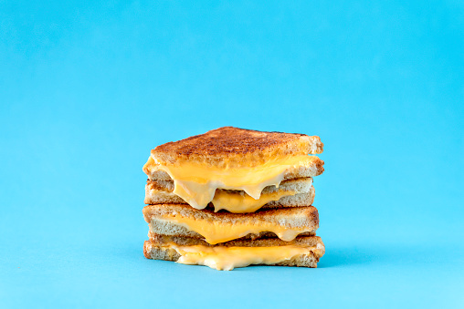 Grilled cheese on a blue background