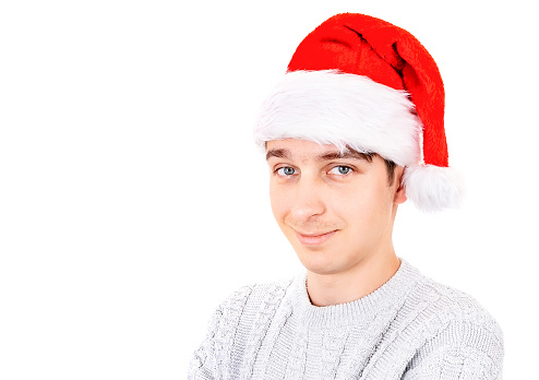 Portrait of Handsome Young Man in Santa Hat Isolated on The White Background