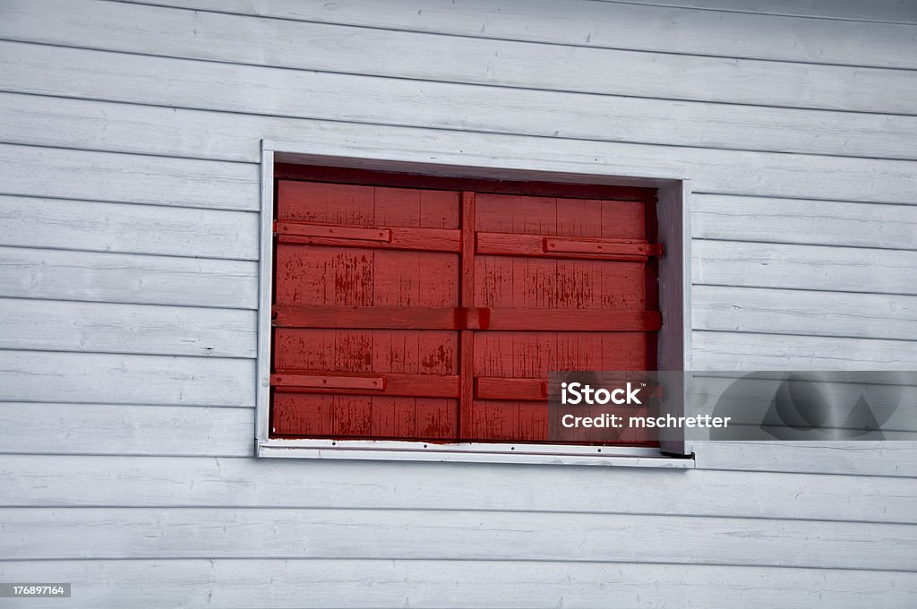 closed red window closed red window of a white house. Architectural Feature Stock Photo