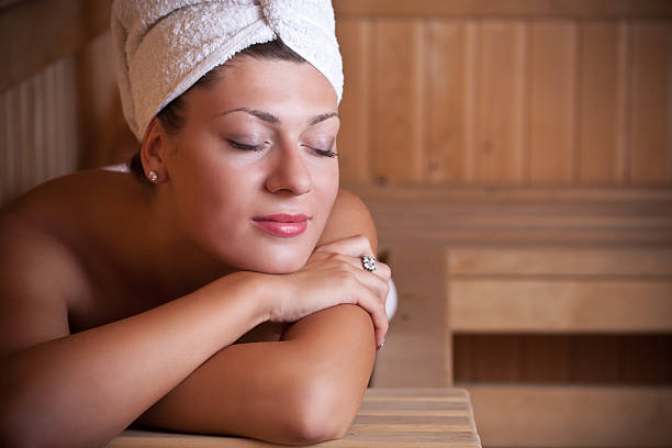 istock Woman relaxing in the sauna 176897290