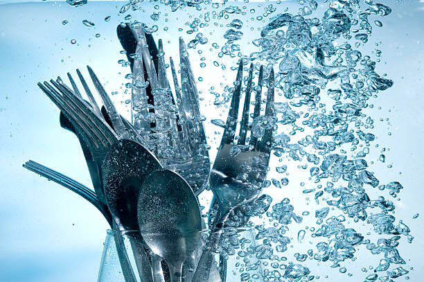 Kitchen ware Washing kitchen ware in clear water wash dishes stock pictures, royalty-free photos & images