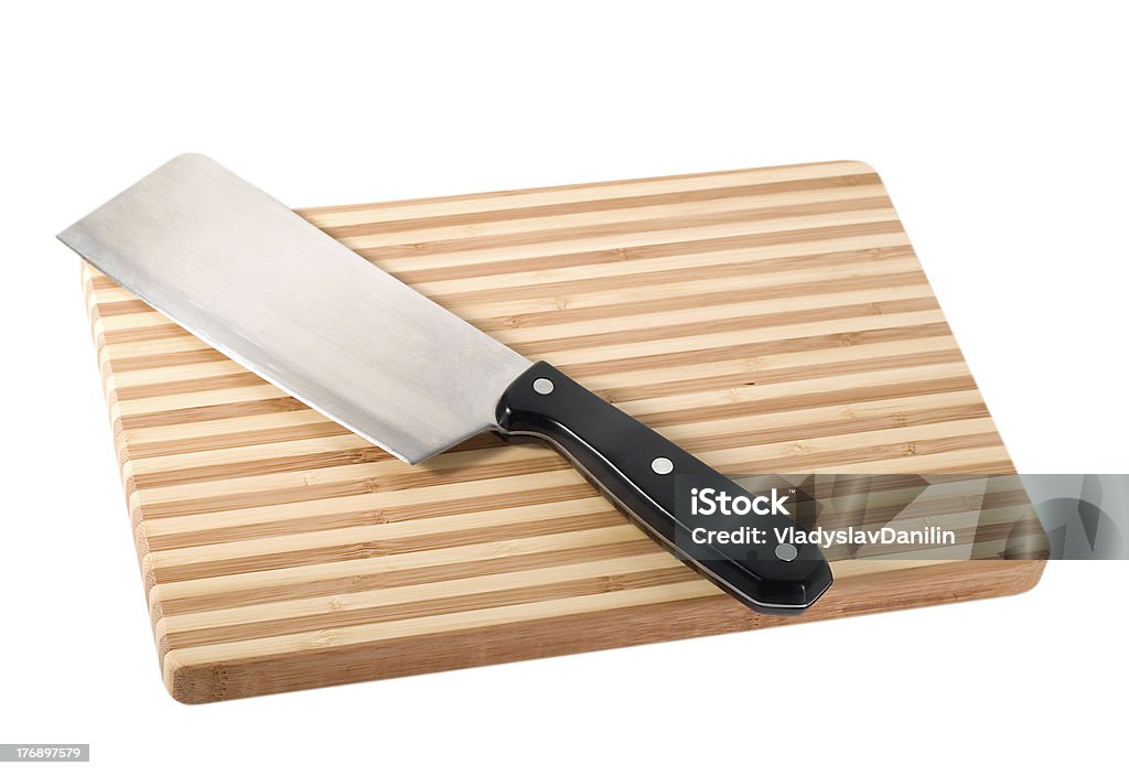 Cuchillo sobre tabla de cortar - Foto de stock de Accesorio personal libre de derechos