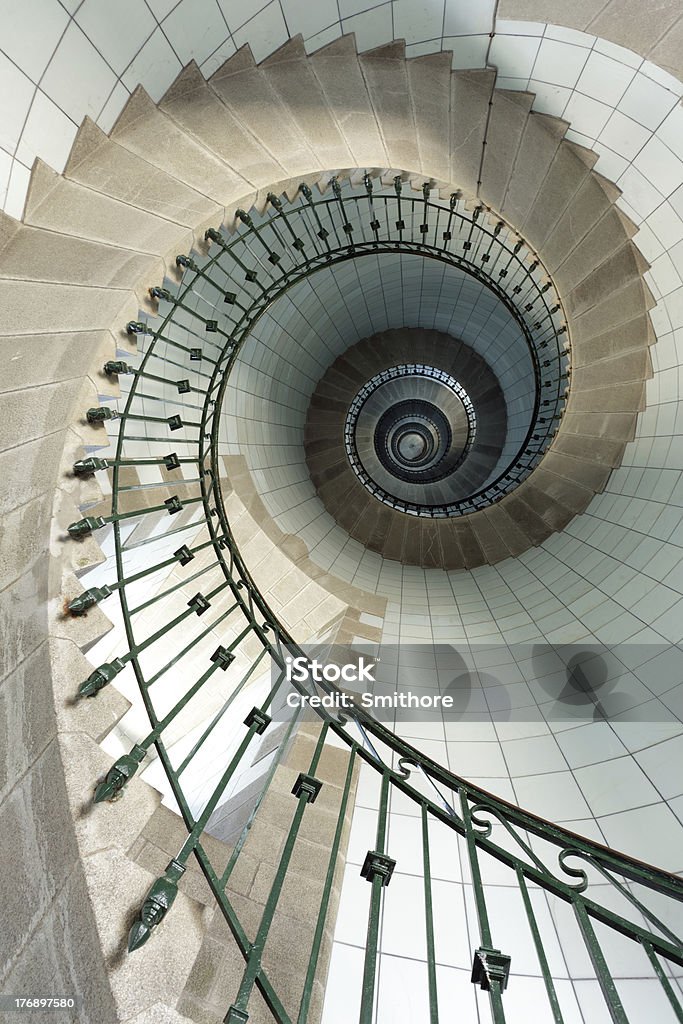 lighthouse staircase dynamic view of high lighthouse staircase, 392 steps, vierge island, brittany,france Abstract Stock Photo