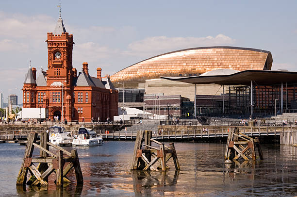 Cardiff Bay Waterfront "A picture of Cardiff Bay Waterfront including the Senedd Building, Pierhead Building & Wales Millennium Centre" cardiff wales stock pictures, royalty-free photos & images