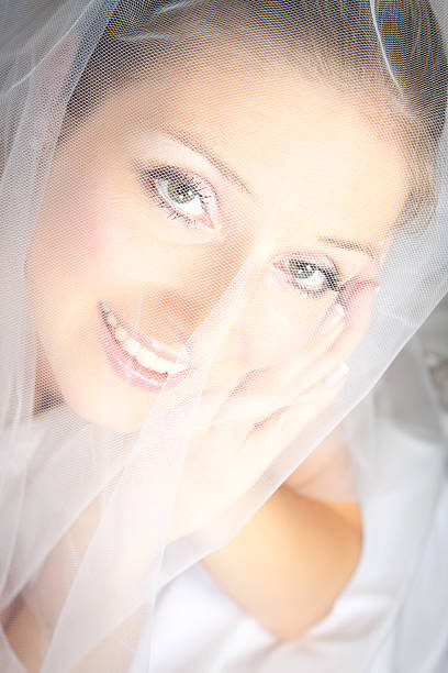 istock Young woman in wedding dress studio 176897839