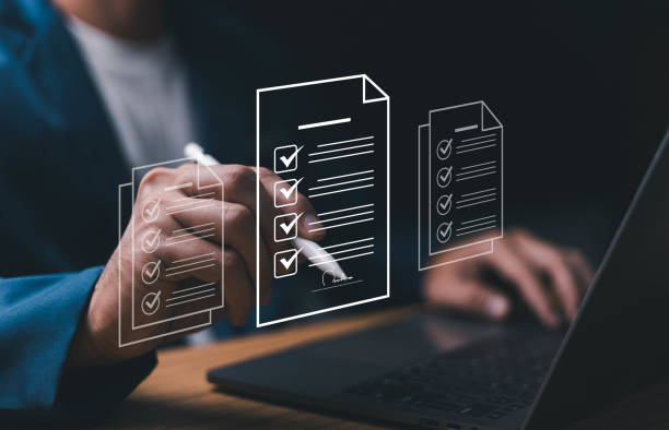 istock E-document management Paperless workplace, e-signing, electronic signature, document management. A businessman signs an electronic document, E-signing. Technology and document management. 1768983791