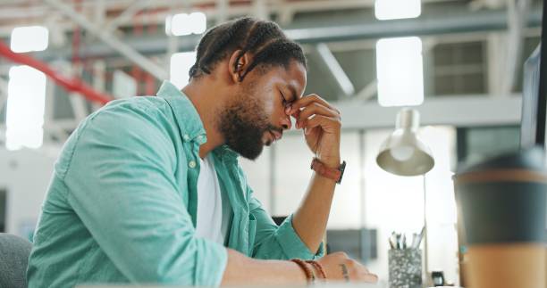 istock Stress, burnout and headache with black man at computer for 404 glitch, exhausted and fatigue. Anxiety, tired and mental health with person in office for frustrated, mistake and website problem 1768987288