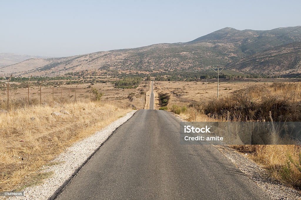 country road at the golan heights,Israel "country road at the golan heights,Israel" Abandoned Stock Photo