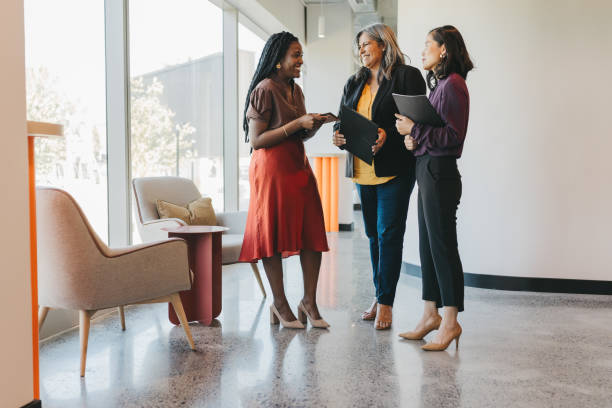 istock Multiracial business partners talking in coworking office space 1768990060