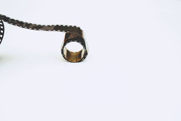 istock Minimal image of a old film roll against white background 1768994192