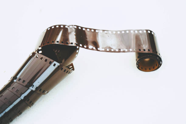 istock Minimal image of a old film roll against white background 1768994203