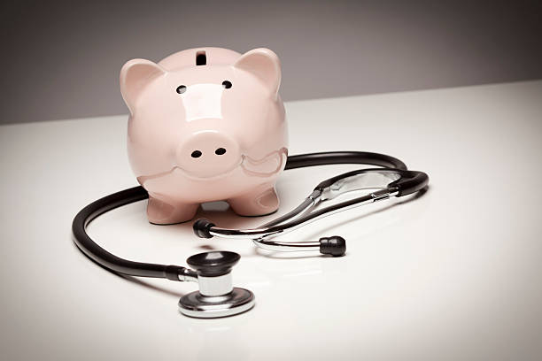 istock Piggy Bank and Stethoscope with Selective Focus 176899549