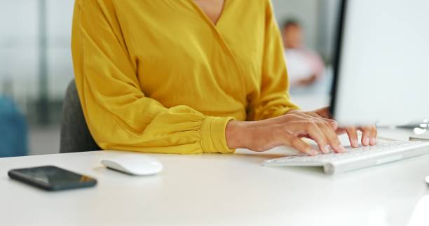 istock Computer, keyboard and woman typing, business and planning with email, copywriting and journalist. Person, employee and editor with a pc, proposal and feedback with review and update company website 1768996710