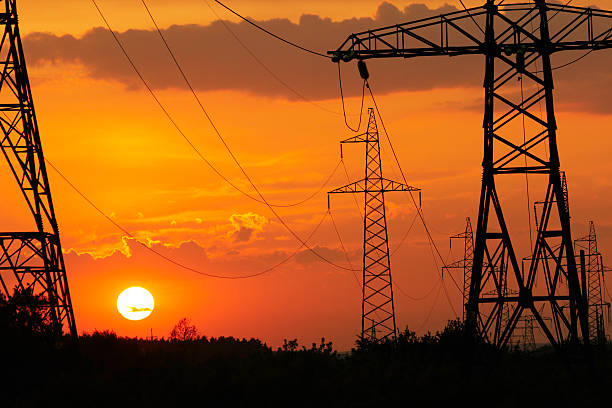 istock Electricity pylons at sunset 176899738