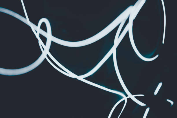 istock Neon light against a black background surrounded a human face in the dark 1768998477