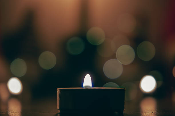 istock A small candle on a bokeh background 1769000803