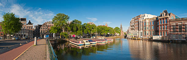 istock Riverboats and reflections, Amsterdam 176900279