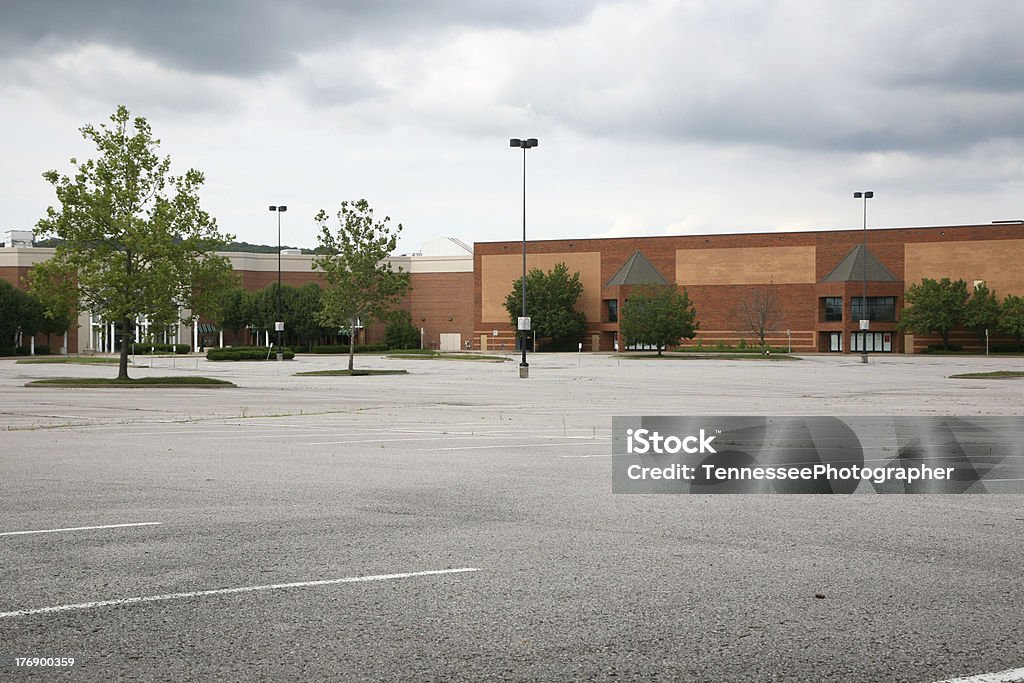 Dark clouds over an empty mall "This relatively new shopping mall is a victim of a depressing economy near Nashville, Tennessee" Shopping Mall Stock Photo