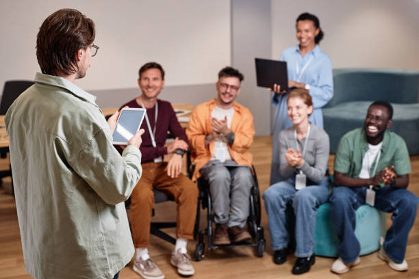 istock Man presenting his report to colleagues 1769004192