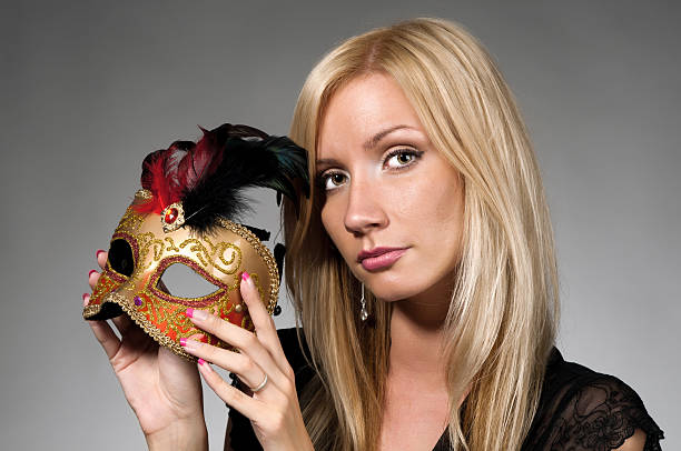 istock Girl with a carnival mask 176901068