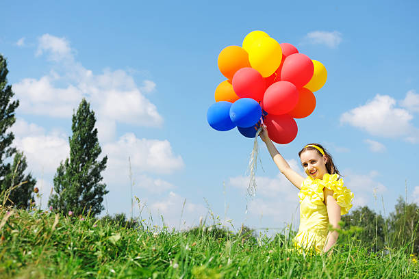 istock Girl with balloons 176901302