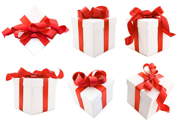 Collection of White Gift Boxs with Red Satin Ribbon Bow stock photo