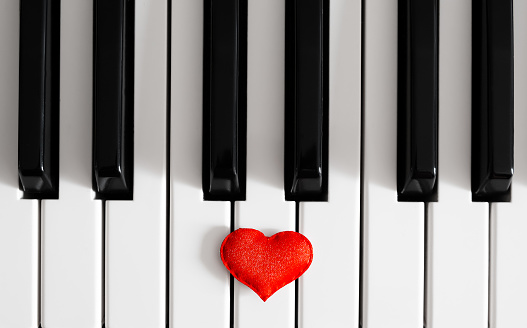 Red Heart Shape on the Piano Keyboard closeup