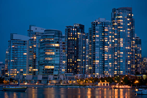 Vancouver's Yaletown at Dusk "A picture perfect view of Vancouver's Yaletown area from the False Creek community on a warm, autumn evening." new urbanism stock pictures, royalty-free photos & images
