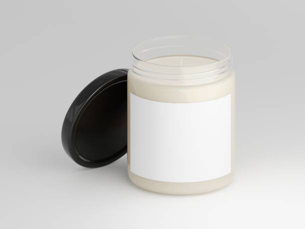 istock Mockup of a 9 oz scented glass candle with blank label space 1769018303