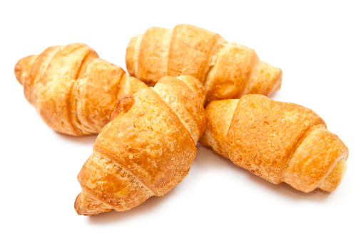 Group of croissants isolated on white background