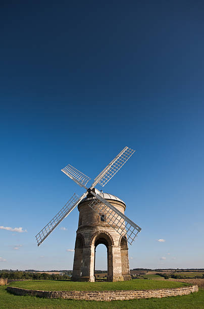 Traditional stone windmill under blue skies "Chesterton Windmill in Warwickshire, England - a traditional stone windmill under deep blue skies on a sunny summer afternoon. Copyspace for your text/design." chesterton photos stock pictures, royalty-free photos & images