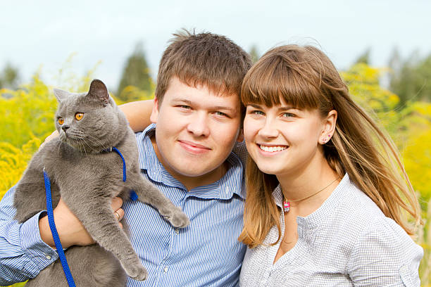 istock Young couple with British cat 176903012