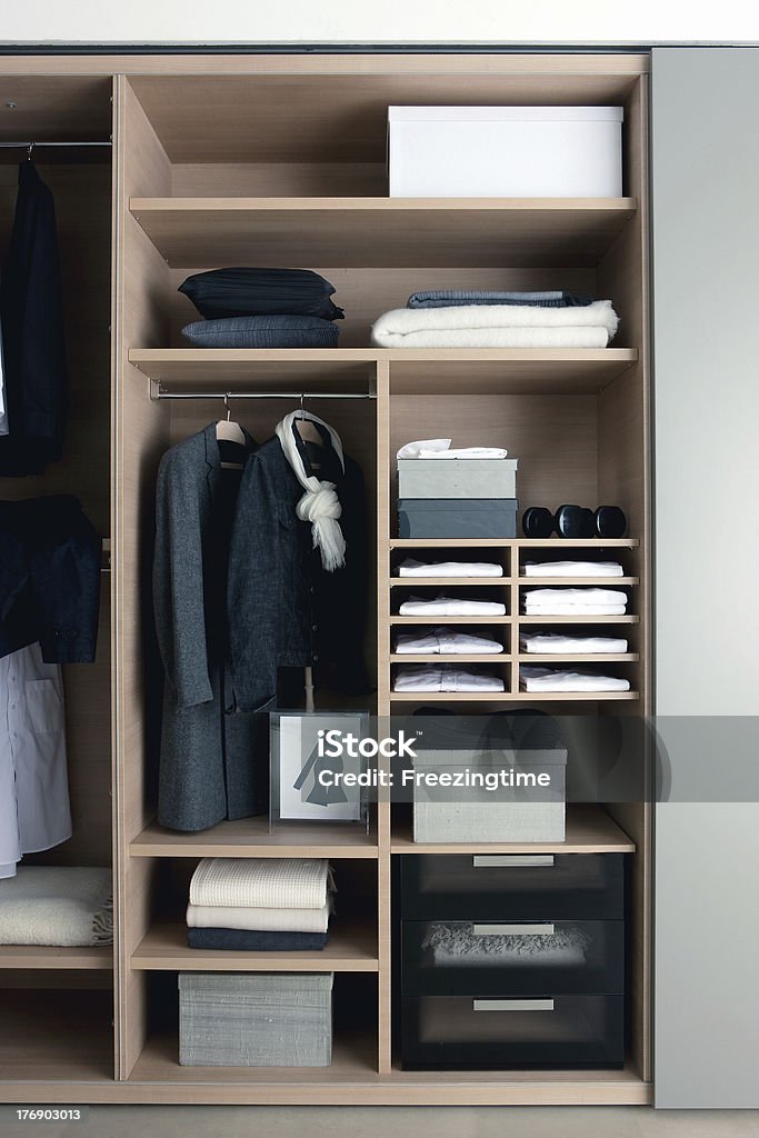 Wardrobe view View of a wardrobe with beautiful clothing.You can find more of my residential interiors here: Closet Stock Photo