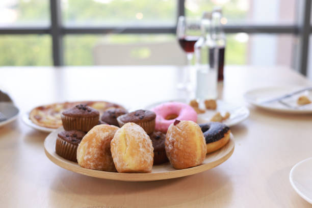Enjoying sweets  donuts for New Year's Eve and Christmas party, Celebration event