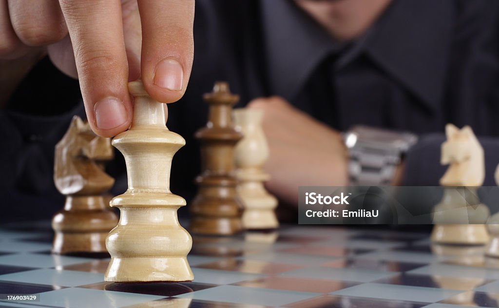 Man playing chess businessman playing chess Black Color Stock Photo