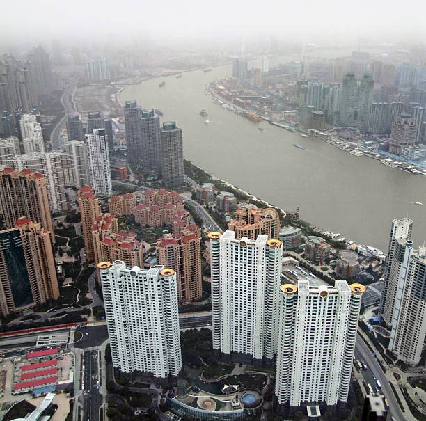 Shanghai, China. January 8, 2025. wide angle panoramic view from below of modern skyscrapers in the city center
