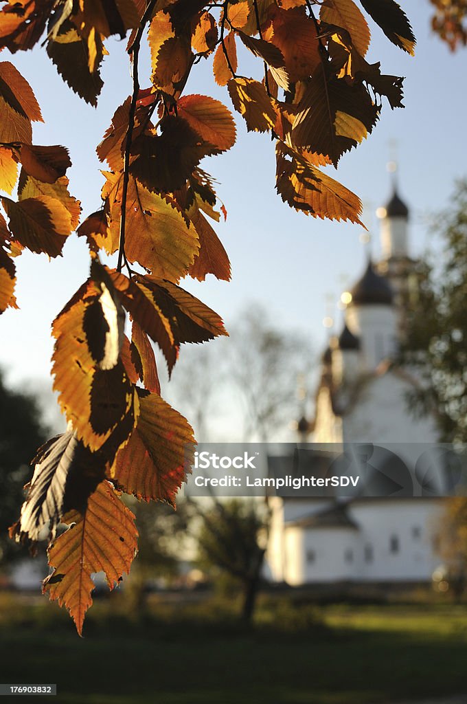 Autumn - time to pray for the summer Beautiful white orthodox church in autumn Arch - Architectural Feature Stock Photo