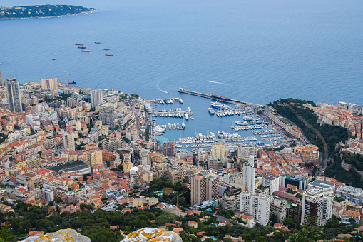 Monte Carlo, Monaco - November 8 2019: Daytime aerial panoramic view of La Condamine and Port Hercules.