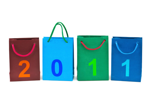 Shopping bags and numbers 2011 isolated on white background