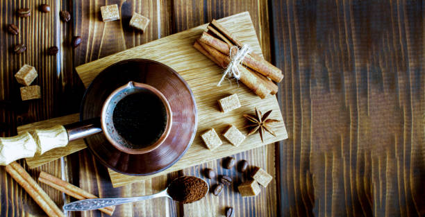 istock Turkish coffee on the cutting board on the wooden background. Copy space. Top view. 1769045232