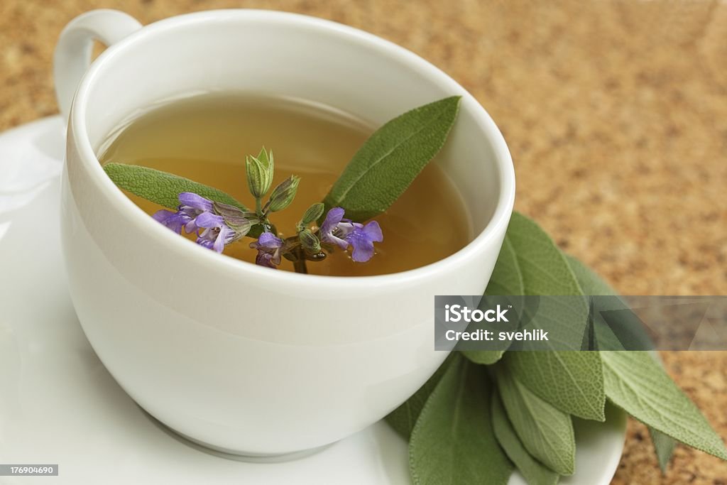 Teacup with herbal sage tea /Salvia officinalis/ Healthy tea or really good for clear skin Alternative Medicine Stock Photo