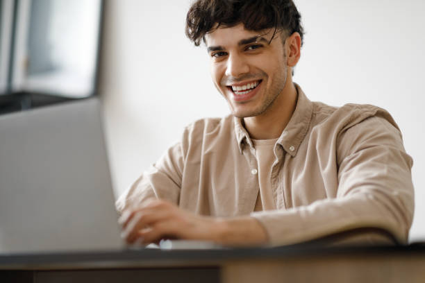 istock Happy Arabic Man Using Laptop Typing And Working In Office 1769051512